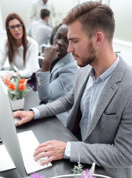 young businessman using a computer in the workplace .people and technology