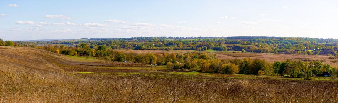 View of the beautiful nature of the autumn at times. Landscape. Ukraine village Olshana. Panorama