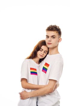 young couple lgbt Flag transgender community light background. High quality photo