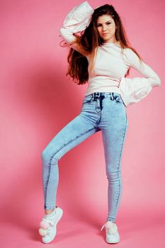 cute pretty red hair teenage girl on pink background, lifestyle modern people concept close up