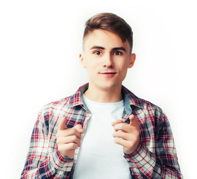 young handsome teenage hipster guy posing emotional, happy smiling against white background isolated, lifestyle people concept close up