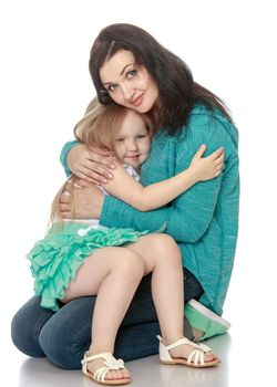 Happy little girl clung to my beloved mother - Isolated on white background