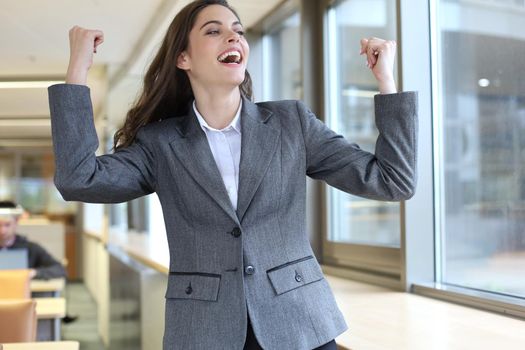 Successful business woman working online on a laptop