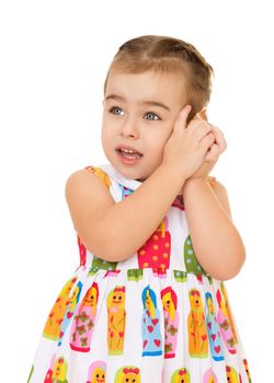 Cute little girl attached to her ear a seashell. The girl wants to hear the sound of the surf-Isolated on white background