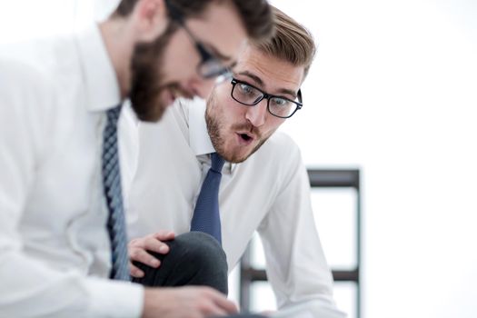 close up.two surprised employees in the workplace.photo with copy space