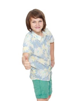 Portrait of a smiling boy in shorts and shirt with short sleeves. The young man raised his thumb to the top. Close-up - Isolated on white background