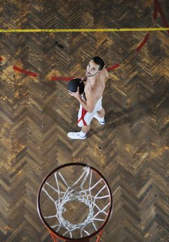 young and healthy people man have recreation and training exercise  while play basketball game at sport gym indoor hall