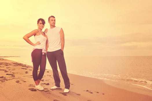 happy young couple in white clothing  have romantic recreation and   fun at beautiful beach on  vacations