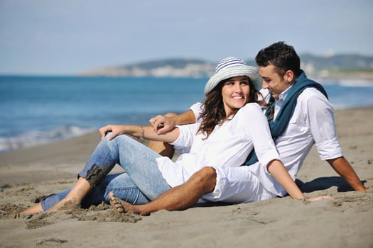 happy young couple in white clothing  have romantic recreation and   fun at beautiful beach on  vacations