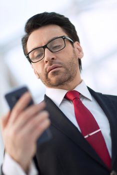 close up.portrait of a modern businessman.people and technology