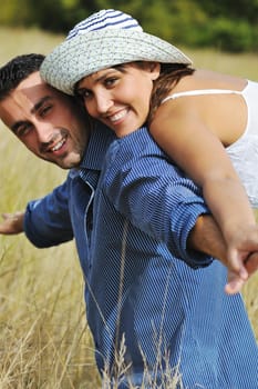 happy young couple have romantic time outdoor while smiling and hug