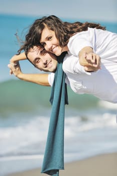 happy young couple in white clothing  have romantic recreation and   fun at beautiful beach on  vacations