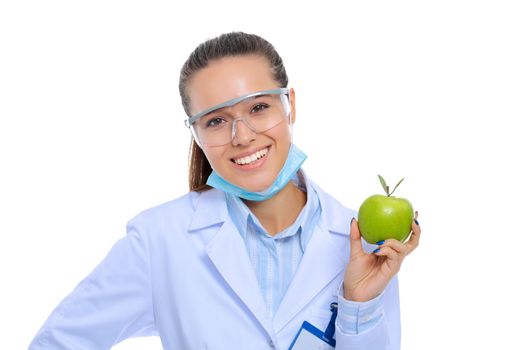 Dentist medical doctor woman hold green fresh apple in hand and tooth brush. Dentist doctors. Woman doctors.