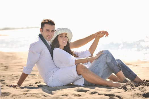 happy young couple in white clothing  have romantic recreation and   fun at beautiful beach on  vacations