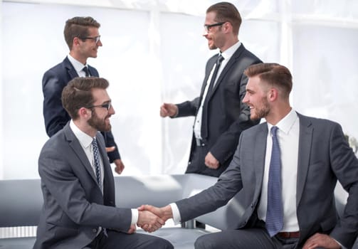 business partners shaking hands after signing the contract.the concept of cooperation