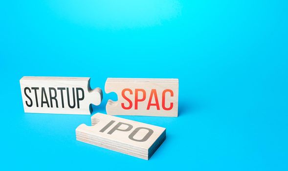 Puzzles symbolize entry of a business startup to the stock exchange through a simplified listing procedure SPAC (Special purpose acquisition company). Merger bypassing stock exchange IPO.