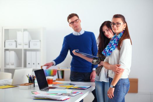 Young business people working at office on new project.