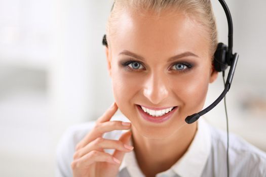 portrait of a customer service agent sitting at office