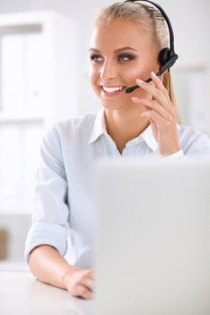 portrait of a customer service agent sitting at office