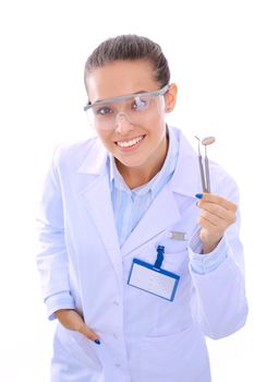 Beautiful female dentist doctor holding and showing a toothbrush isolated on a white background. Dentist doctor.