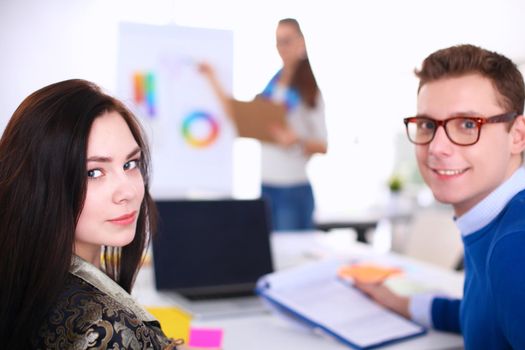 Young business people working at office on new project.