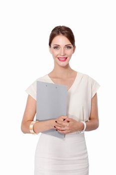 Portrait of a young woman working at office desk