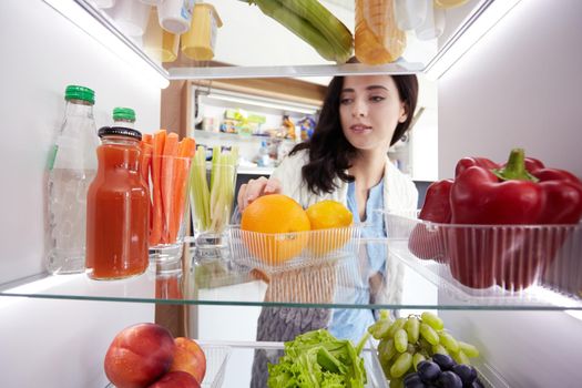 Open refrigerator with fresh fruits and vegetable. Open refrigerator.