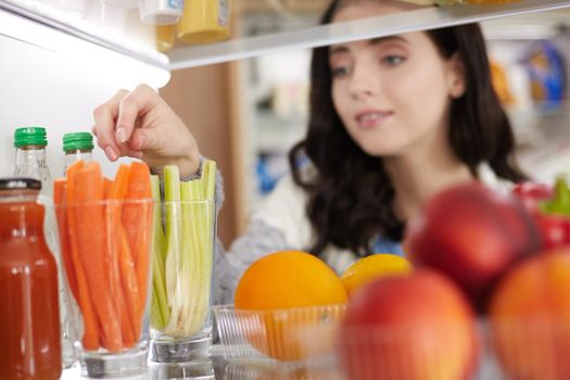 Open refrigerator with fresh fruits and vegetable. Open refrigerator.