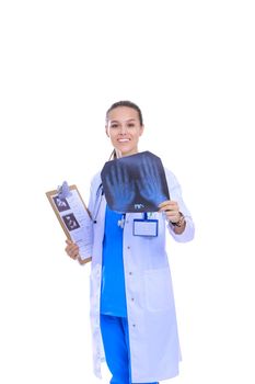Young female doctor looking at the x-ray picture isolated on white background. Woman doctor.