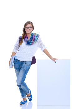 Beautiful student woman pointing on blank board. Student