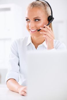 portrait of a customer service agent sitting at office