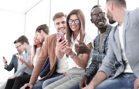 group of young people with smartphones.people and technology