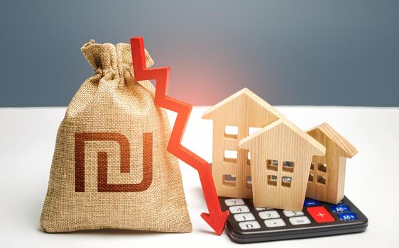 Israeli shekel money bag with down arrow and houses on calculator. Reducing maintaining cost, increasing energy efficiency. Falling real estate market, low prices and demand. Saving resources.