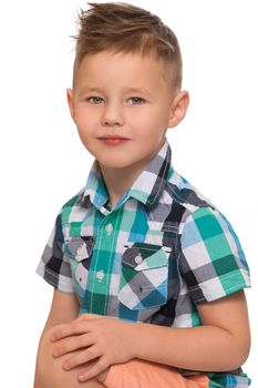 Beautiful Caucasian little boy with a fashionable hairstyle on the head . close-up - Isolated on white background