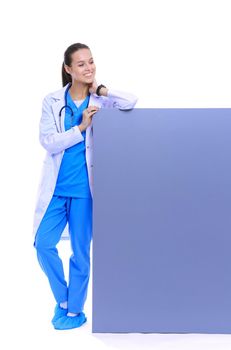 A female doctor with a blank billboard. Woman doctor.