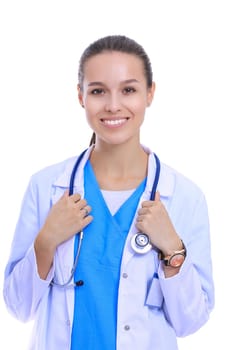 Beautiful young woman in white coat posing with hand in pocket. Woman doctor.