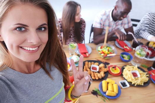 Group of people doing selfie during lunch. Self. Friends. Friends are photographed for eating.