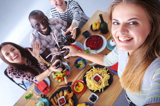 Group of people doing selfie during lunch. Self. Friends. Friends are photographed for eating.