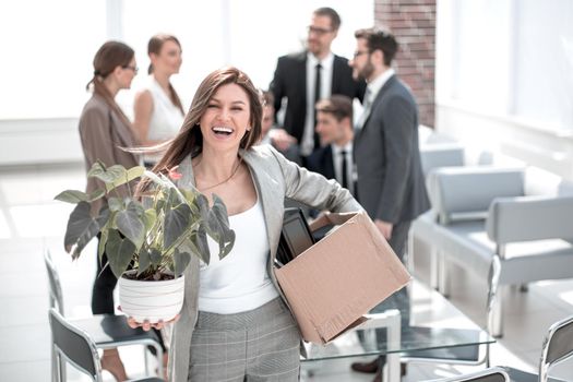 happy young business woman standing in new office.business concept