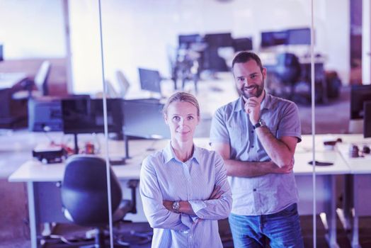 business couple working together on project at modern startup office