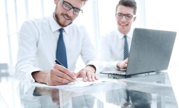 businessman makes notes for a new business project.photo with copy space