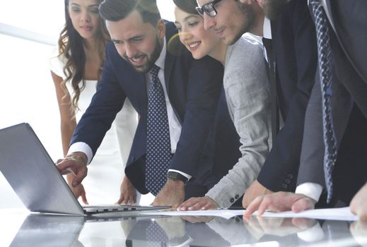 business team looking at the laptop screen.people and technology