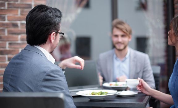 business team discussing issues during the lunch break.the concept of teamwork