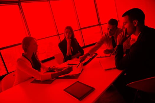 Group of happy young  business people in a meeting at office