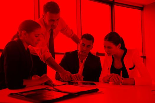 Group of happy young  business people in a meeting at office