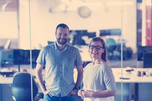 business couple working together on project at modern startup office