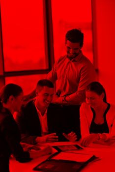 Group of happy young  business people in a meeting at office