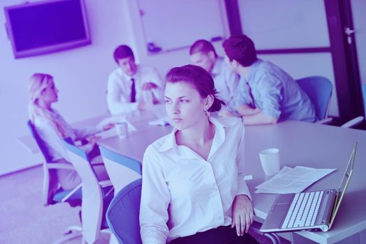 business woman  with her staff,  people group in background at modern bright office indoors