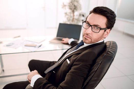 responsible businessman sitting at his Desk.business people