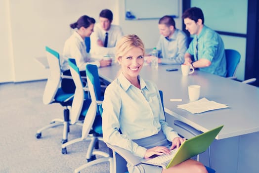 Group of happy young  business people in a meeting at office